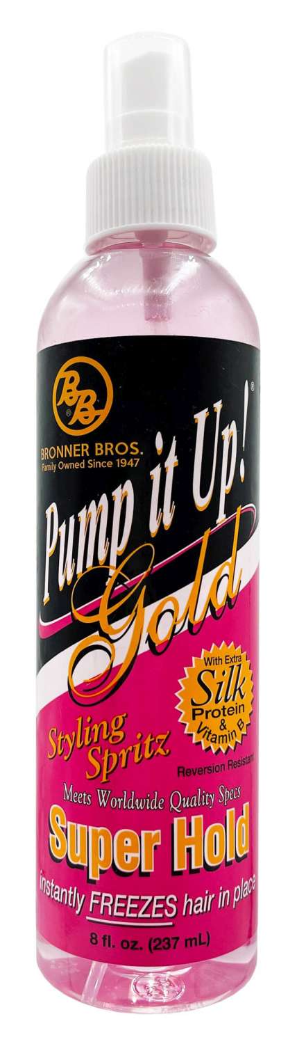 A pink spray bottle labeled Pump it Up! Gold Styling Spritz Super Hold by Bronner Bros. is shown, as spotted at Jazz Beauty Supply in Detroit. The label claims it instantly freezes hair in place and contains extra silk protein. 8 fl. oz. (237 ml).