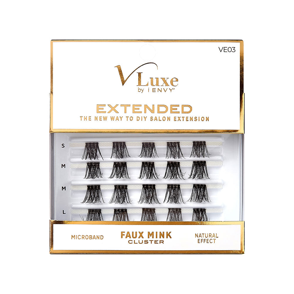 A box of V Luxe by i-Envy Extended faux mink cluster lashes, available at Jazz Beauty Supply in Detroit, featuring multiple rows of individual lash clusters in various lengths, labeled S, M, and L. The packaging is white with gold accents.