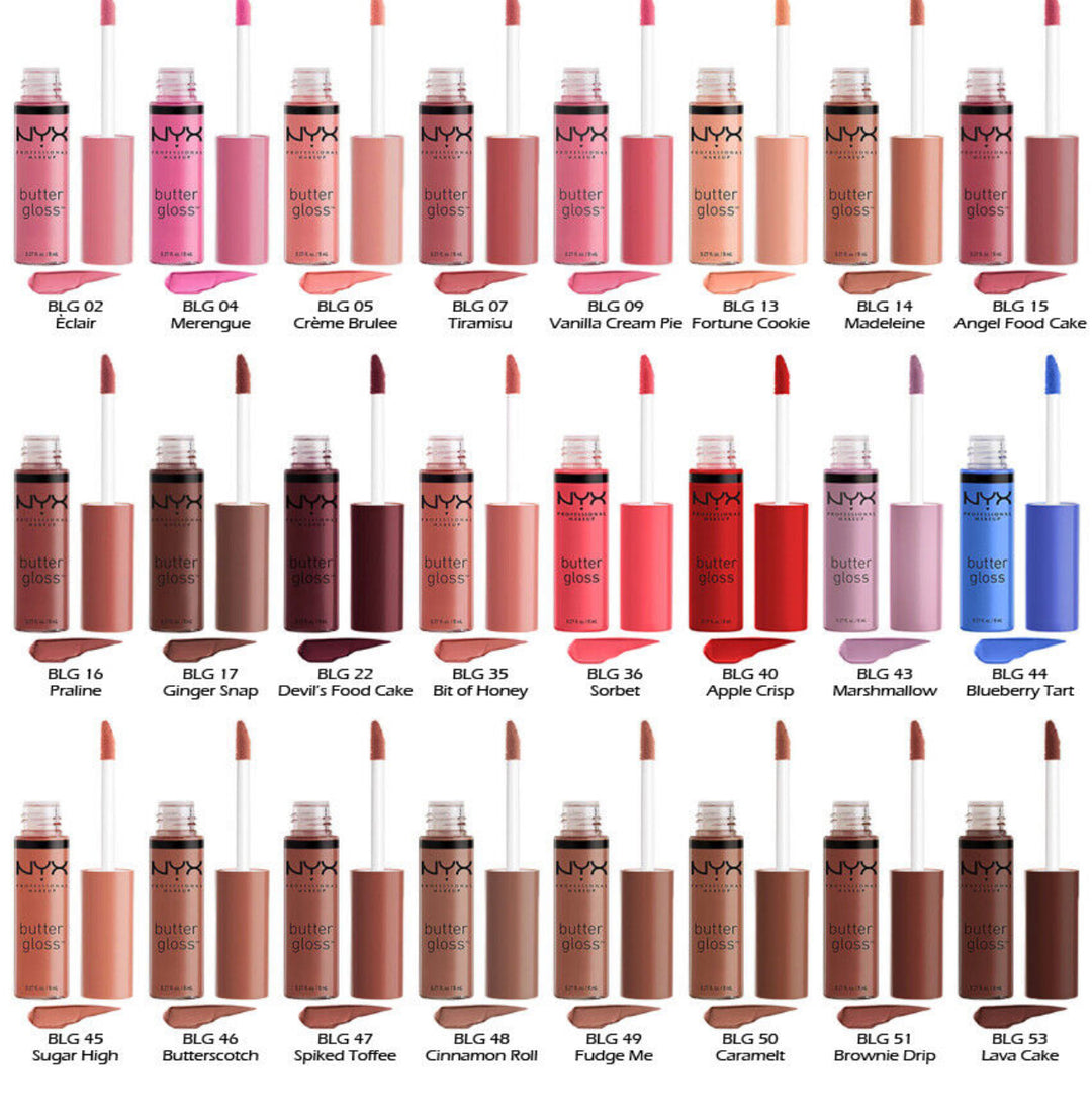 A display of 24 NYX Butter Gloss lip gloss tubes at Jazz Beauty Supply in Detroit, each opened to show the applicator. Shades range from nude and pink to brown and red, with names and numbers labeled below each gloss.